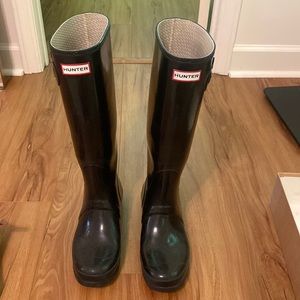Black shiny tall hunter boots